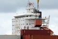 Cargo ship workers unloading containers in Ports of Auckland